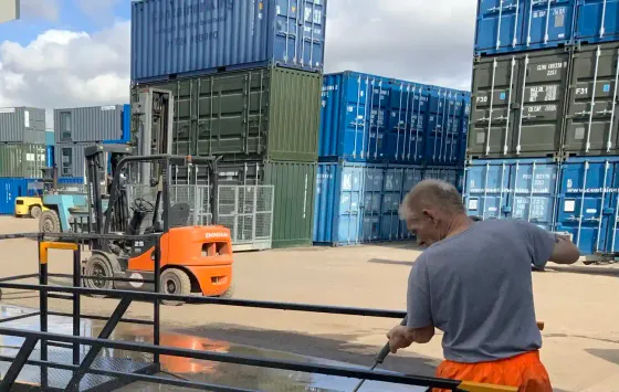 A member of the ISOv8® by ContainerKing® team working in the container yard in Scunthorpe